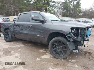 2023 Ram 1500 Laramie with VIN 1C6SRFJT2PN662144, listed as a IAAI auction lot 41427920 with 35,188 mi miles and . Bid and sale history available at DreamBid. Image 1.