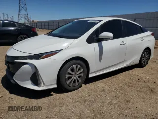2022 Toyota Prius LE z VIN JTDKAMFP8N3197278, wystawiony jako Copart lot #55828765 z przebiegiem 122 709 mil mil oraz Szkoda całkowita • Salvage title. Historia ofert i sprzedaży dostępna na DreamBid. Obrazek 1.