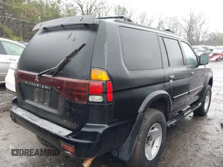 2000 Mitsubishi Montero Sport LS with VIN JA4LS31H6YP004497, listed as a IAAI auction lot 41403319 with 259,107 mi miles. Bid and sale history available at carsss.com. Image 4.
