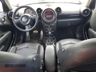 2015 MINI Countryman S z VIN WMWZC3C58FWT06471, wystawiony jako Copart lot #57570585 z przebiegiem 101 963 mil mil oraz Tytuł czysty. Historia ofert i sprzedaży dostępna na DreamBid. Obrazek 8.