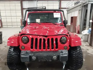 2011 Jeep Wrangler Sahara with VIN 1J4AA5D10BL593534, listed as a IAAI auction lot 41551416 with 101,716 mi miles and . Bid and sale history available at DreamBid. Image 12.