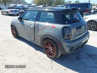 2016 MINI Hardtop John Cooper Works with VIN WMWXM9C58GT996815, listed as a IAAI auction lot 41756661 with 146,450 mi miles and . Bid and sale history available at DreamBid. Image 3.