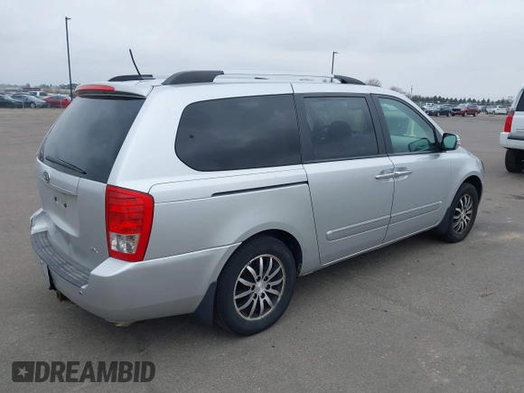 2012 Kia Sedona EX with VIN KNDMH4C78C6431441, listed as a IAAI auction lot 42013427 with 213,147 mi miles. Bid and sale history available at carsss.com. Image 4.