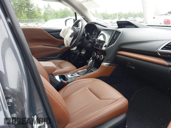 2021 Subaru Forester Touring z VIN JF2SKAXC8MH477969, wystawiony jako IAAI lot #42461540 z przebiegiem 29 143 mil mil oraz . Historia ofert i sprzedaży dostępna na DreamBid. Obrazek 5.