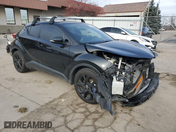 2021 Toyota C-HR LE with VIN JTNKHMBX6M1099910, listed as a Copart auction lot 82800054 with 43,276 mi miles and Salvage Title. Bid and sale history available at DreamBid. Image 4.