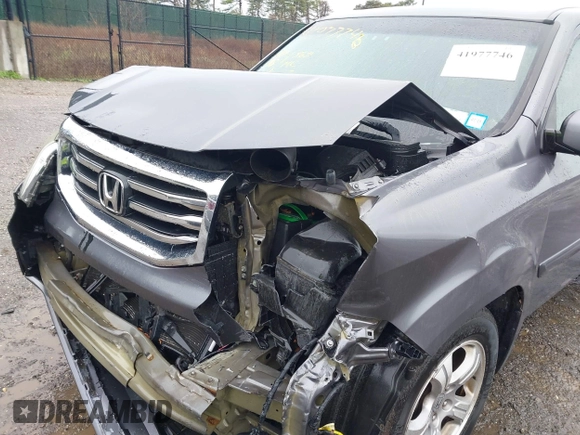 2015 Honda Pilot EX-L with VIN 5FNYF4H51FB064583, listed as a IAAI auction lot 41977746 with 120,398 mi miles and . Bid and sale history available at carsss.com. Image 18.