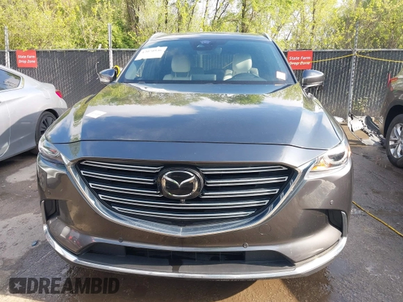 2020 Mazda CX-9 Signature with VIN JM3TCBEYXL0402053, listed as a IAAI auction lot 42070846 with 47,695 mi miles and . Bid and sale history available at DreamBid. Image 13.
