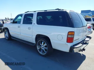 2002 Chevrolet Suburban LS with VIN 1GNEC16T32J198422, listed as a IAAI auction lot 41699753 with 204,504 mi miles. Bid and sale history available at carsss.com. Image 3.