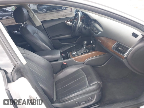 2014 Audi A7 3.0 Prestige with VIN WAU2GAFC7EN059419, listed as a IAAI auction lot 41702771 with 134,474 mi miles. Bid and sale history available at carsss.com. Image 5.