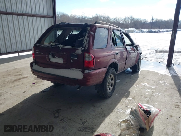 2003 Isuzu Rodeo with VIN 4S2CK58W534304195, listed as a IAAI auction lot 41354536 with Not Provided miles and . Bid and sale history available at DreamBid. Image 4.