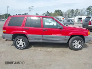 1996 Jeep Grand Cherokee Laredo with VIN 1J4FX58S4TC346218, listed as a IAAI auction lot 41943268 with 138,431 mi miles and . Bid and sale history available at DreamBid. Image 13.