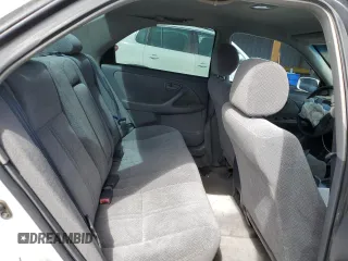 2000 Toyota Camry CE z VIN JT2BG22K2Y0479735, wystawiony jako Copart lot #50226755 z przebiegiem 282 694 mil mil oraz Nie do naprawy • Non repairable. Historia ofert i sprzedaży dostępna na DreamBid. Obrazek 11.