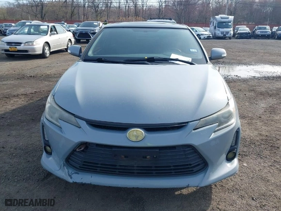 2014 Scion tC with VIN JTKJF5C71E3081033, listed as a IAAI auction lot 41928949 with 144,112 mi miles. Bid and sale history available at carsss.com. Image 12.
