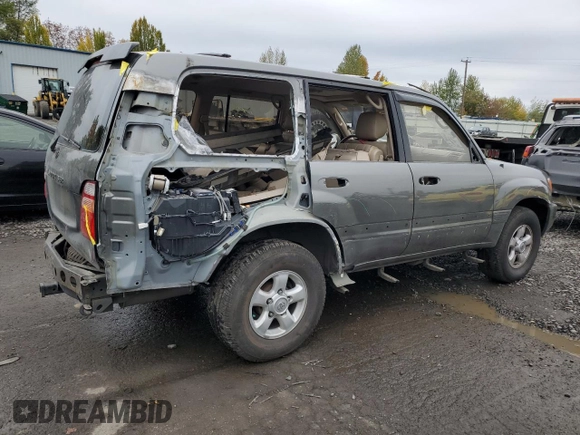 2000 Toyota Land Cruiser with VIN JT3HT05J7Y0084006, listed as a Copart auction lot 76390254 with 142,620 mi miles and Salvage Title. Bid and sale history available at carsss.com. Image 3.