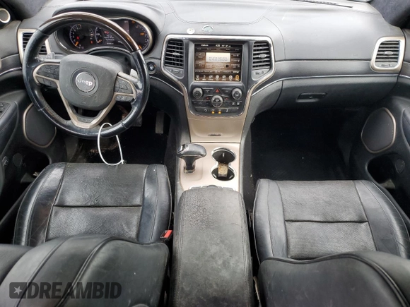 2014 Jeep Grand Cherokee Summit with VIN 1C4RJFJG1EC323658, listed as a Copart auction lot 50740115 with 253,656 mi miles and Salvage title. Bid and sale history available at DreamBid. Image 8.