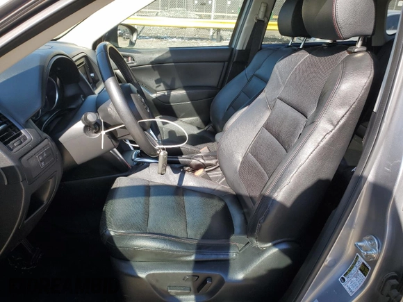 2015 Mazda CX-5 Grand Touring with VIN JM3KE4DY5F0460465, listed as a Copart auction lot 46392605 with 103,185 mi miles and Salvage Title. Bid and sale history available at carsss.com. Image 7.