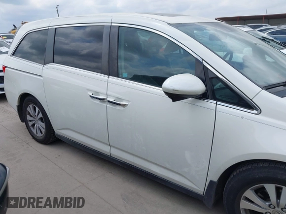 2015 Honda Odyssey EX-L z VIN 5FNRL5H60FB102770, wystawiony jako IAAI lot #42147486 z przebiegiem 160 958 mil mil oraz . Historia ofert i sprzedaży dostępna na DreamBid. Obrazek 14.