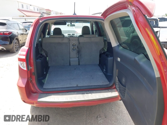 2009 Toyota RAV4 with VIN JTMZF33V39D001714, listed as a IAAI auction lot 42074989 with 213,771 mi miles. Bid and sale history available at carsss.com. Image 12.
