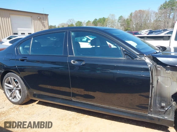 2019 BMW 7 Series 740i xDrive with VIN WBA7E4C57KGV70521, listed as a IAAI auction lot 41881538 with 114,480 mi miles and . Bid and sale history available at DreamBid. Image 14.