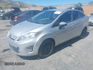 2013 Ford Fiesta S with VIN 3FADP4AJ0DM195196, listed as a IAAI auction lot 41817500 with 124,662 mi miles and . Bid and sale history available at DreamBid. Image 2.