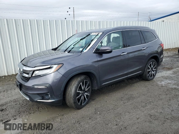 2020 Honda Pilot Touring 7-Passenger with VIN 5FNYF6H60LB039609, listed as a Copart auction lot 51753425 with 57,512 mi miles and Salvage title. Bid and sale history available at DreamBid. Image 1.