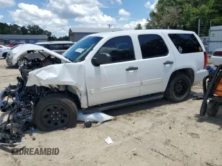 2014 Chevrolet Tahoe Commercial with VIN 1GNLC2E04ER202441, listed as a Copart auction lot 61310725 with 117,443 mi miles and Salvage title. Bid and sale history available at DreamBid. Image 1.