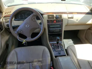 2001 Mercedes-Benz E-Class AWD with VIN WDBJH82J71X051634, listed as a Copart auction lot 51299544 with 286,211 mi miles and Salvage Title. Bid and sale history available at carsss.com. Image 8.