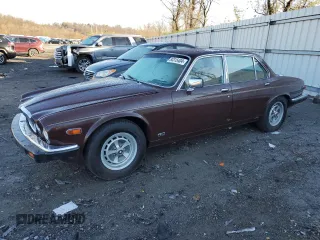 1984 Jaguar XJ z VIN SAJAV1347EC378740, wystawiony jako Copart lot #80315404 z przebiegiem 100 204 mil mil oraz Czysty tytuł • Clean title. Historia ofert i sprzedaży dostępna na DreamBid. Obrazek 1.
