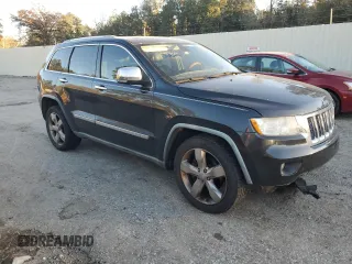 2011 Jeep Grand Cherokee Overland with VIN 1J4RS6GG0BC557302, listed as a Copart auction lot 83851734 with 195,443 mi miles and Salvage Title. Bid and sale history available at DreamBid. Image 4.