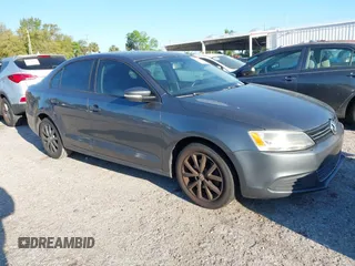 2011 Volkswagen Jetta Sedan SE w/Convenience & Sunroof with VIN 3VWDX7AJ7BM384398, listed as a IAAI auction lot 41781099 with 144,963 mi miles. Bid and sale history available at carsss.com. Image 1.