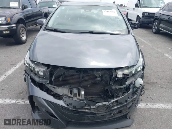2021 Toyota Prius LE with VIN JTDKAMFP0M3193305, listed as a IAAI auction lot 42283494 with 322,523 mi miles and . Bid and sale history available at DreamBid. Image 12.
