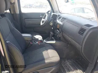 2007 Hummer H3 SUV with VIN 5GTDN13E878233953, listed as a IAAI auction lot 42012596 with 232,919 mi miles. Bid and sale history available at carsss.com. Image 5.