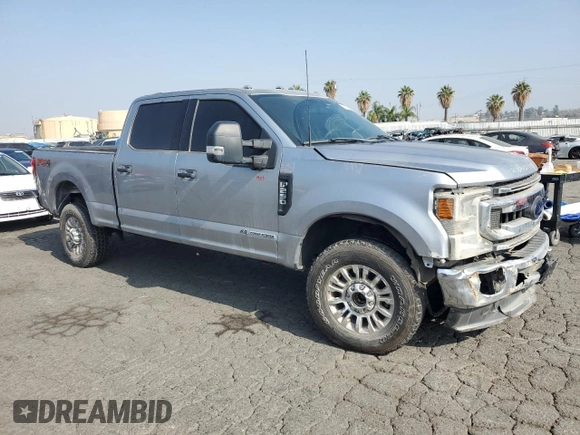 2022 Ford F-250 XL with VIN 1FT8W2BT0NEE39357, listed as a Copart auction lot 62615585 with 54,794 mi miles and Salvage title. Bid and sale history available at DreamBid. Image 4.