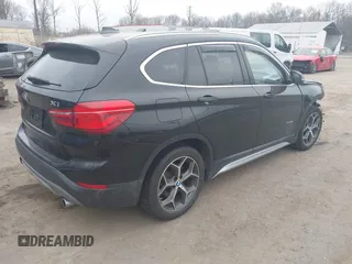 2017 BMW X1 xDrive28i with VIN WBXHT3C31H5F72958, listed as a IAAI auction lot 41782257 with 134,829 mi miles. Bid and sale history available at carsss.com. Image 4.