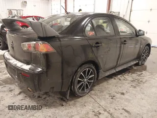 2015 Mitsubishi Lancer SE with VIN JA32V2FW6FU019508, listed as a IAAI auction lot 41633196 with 91,758 mi miles. Bid and sale history available at carsss.com. Image 4.