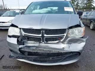 2014 Dodge Grand Caravan SE with VIN 2C4RDGBG7ER131079, listed as a IAAI auction lot 41614495 with 122,925 mi miles. Bid and sale history available at carsss.com. Image 6.