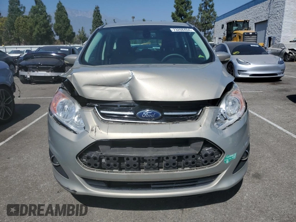 2015 Ford C-Max SEL with VIN 1FADP5CU9FL115704, listed as a Copart auction lot 73208404 with 130,343 mi miles and Salvage Title. Bid and sale history available at carsss.com. Image 5.