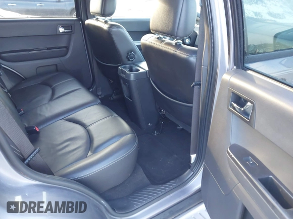 2008 Mercury Mariner Premier with VIN 4M2CU97128KJ38119, listed as a IAAI auction lot 41213121 with 76,699 mi miles and . Bid and sale history available at DreamBid. Image 8.