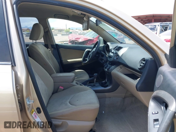 2009 Toyota RAV4 with VIN JTMZF35V695008938, listed as a IAAI auction lot 42049721 with 197,612 mi miles. Bid and sale history available at carsss.com. Image 5.
