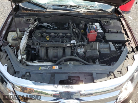 2012 Ford Fusion SE z VIN 3FAHP0HAXCR253297, wystawiony jako Copart lot #60302645 z przebiegiem 138 619 mil mil oraz Szkoda całkowita • Salvage title. Historia ofert i sprzedaży dostępna na DreamBid. Obrazek 11.