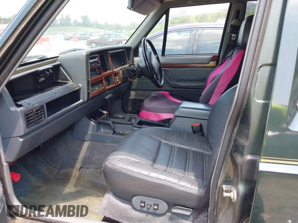 1995 Jeep Cherokee with VIN 1J4FN78S1SL640692, listed as a IAAI auction lot 42577079 with 232,087 mi miles and . Bid and sale history available at DreamBid. Image 5.