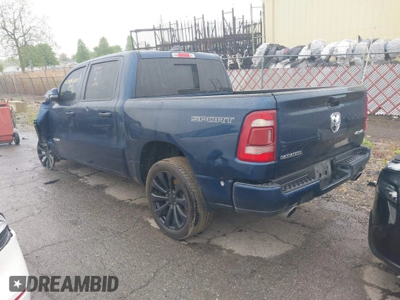 2023 Ram 1500 Laramie with VIN 1C6SRFJT9PN542437, listed as a IAAI auction lot 42256410 with 5 mi miles and . Bid and sale history available at DreamBid. Image 3.