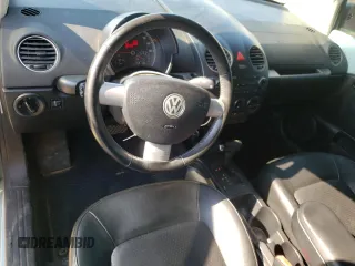 2010 Volkswagen Beetle with VIN 3VWRG3AG0AM027565, listed as a Copart auction lot 61908315 with 74,858 mi miles and Salvage title. Bid and sale history available at DreamBid. Image 8.