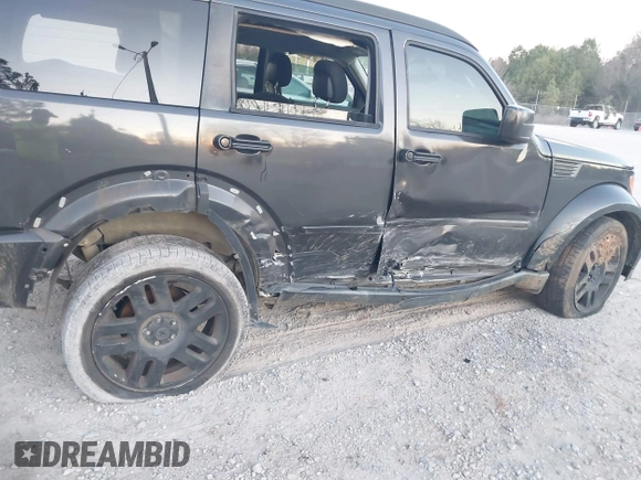 2010 Dodge Nitro SE with VIN 1D4PT2GK3AW137797, listed as a IAAI auction lot 41689701 with 182,452 mi miles. Bid and sale history available at carsss.com. Image 6.