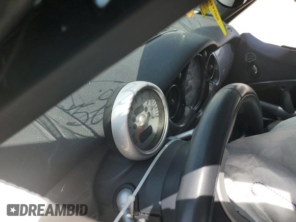 2006 MINI Hardtop with VIN WMWRC33566TK15023, listed as a Copart auction lot 76392014 with Not provided miles and Salvage title. Bid and sale history available at DreamBid. Image 9.