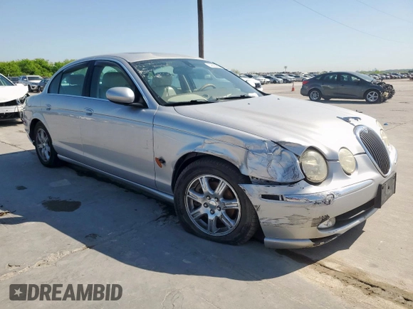 2003 Jaguar S-Type with VIN SAJEA01T43FM62477, listed as a Copart auction lot 52693085 with 109,761 mi miles and Salvage Title. Bid and sale history available at DreamBid. Image 4.