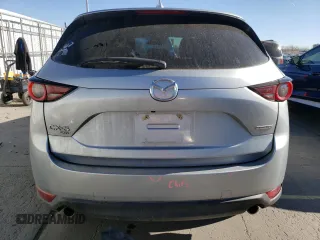 2020 Mazda CX-5 Touring with VIN JM3KFBCM3L0793369, listed as a Copart auction lot 49724385 with 88,470 mi miles and Salvage Title. Bid and sale history available at carsss.com. Image 6.