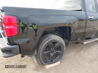 2017 Chevrolet Silverado 1500 LS with VIN 1GCRCNEC5HZ346938, listed as a IAAI auction lot 41686505 with 123,746 mi miles and . Bid and sale history available at DreamBid. Image 6.