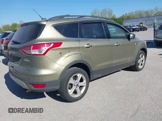 2013 Ford Escape SE с VIN 1FMCU0GXXDUA15555, выставлен на аукционе IAAI как лот 42227394 с пробегом 143 214 миль миль и . История ставок и продаж доступна на DreamBid. Изображение 4.