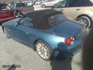2004 BMW Z4 2.5i with VIN 4USBT33524LR67071, listed as a IAAI auction lot 41632627 with 106,084 mi miles. Bid and sale history available at carsss.com. Image 3.